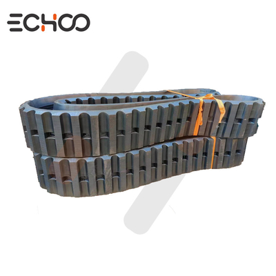 A pista de borracha encaixa no quadro do trem de pouso do Yanmar C80R-1 Crawler